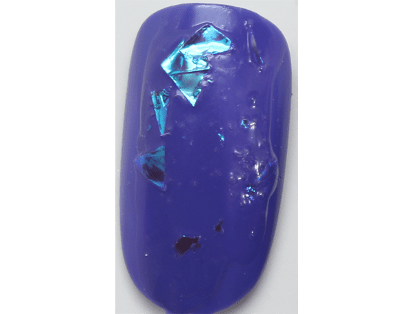 Models Own Mermaid Tears on top of Pukka Purple Nail Polish
