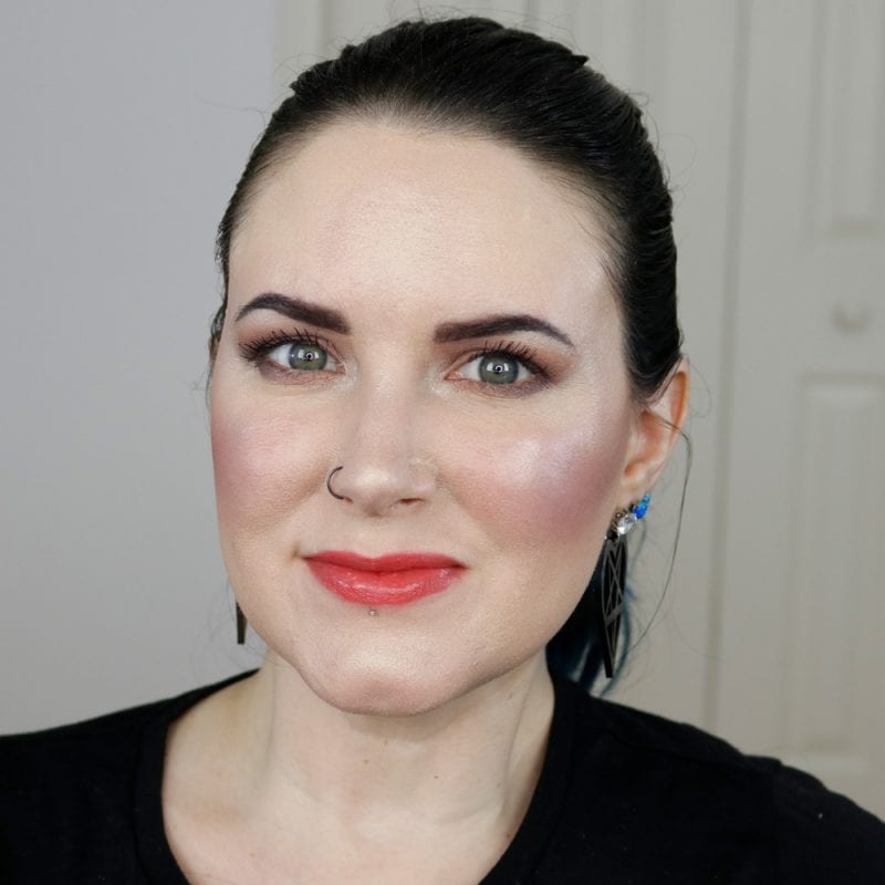 Urban Decay Beached Vice Lipstick in 100 Degrees swatched on pale skin