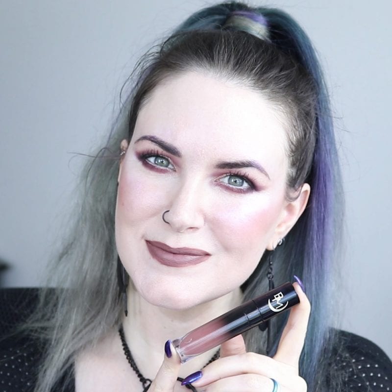 Black Moon Haunting Liquid Lipstick swatched on fair skin