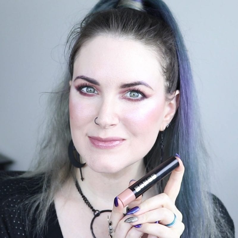 Buxom Pyro Lipstick swatched on fair skin