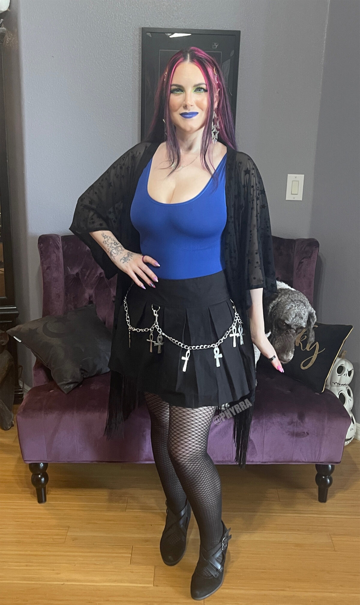 Cordelia is wearing Shapellx AirSlim Fishnet Shaping Tights in this classic goth fashion outfit