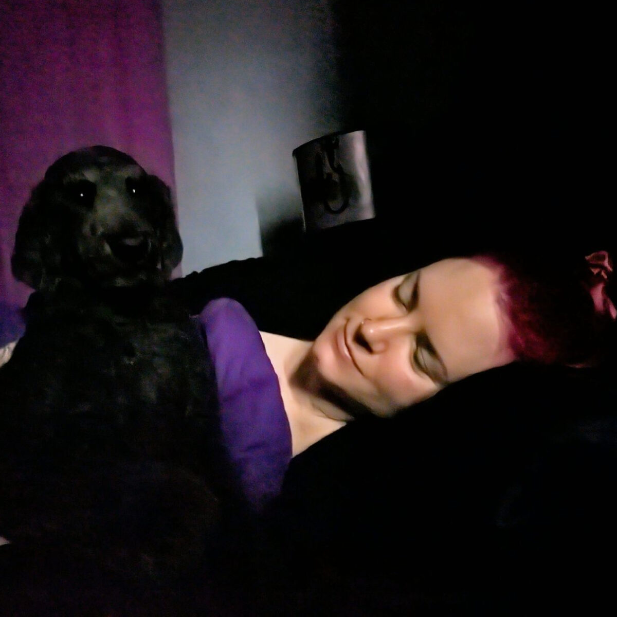 Nyx & Cordelia cuddling in bed in the morning