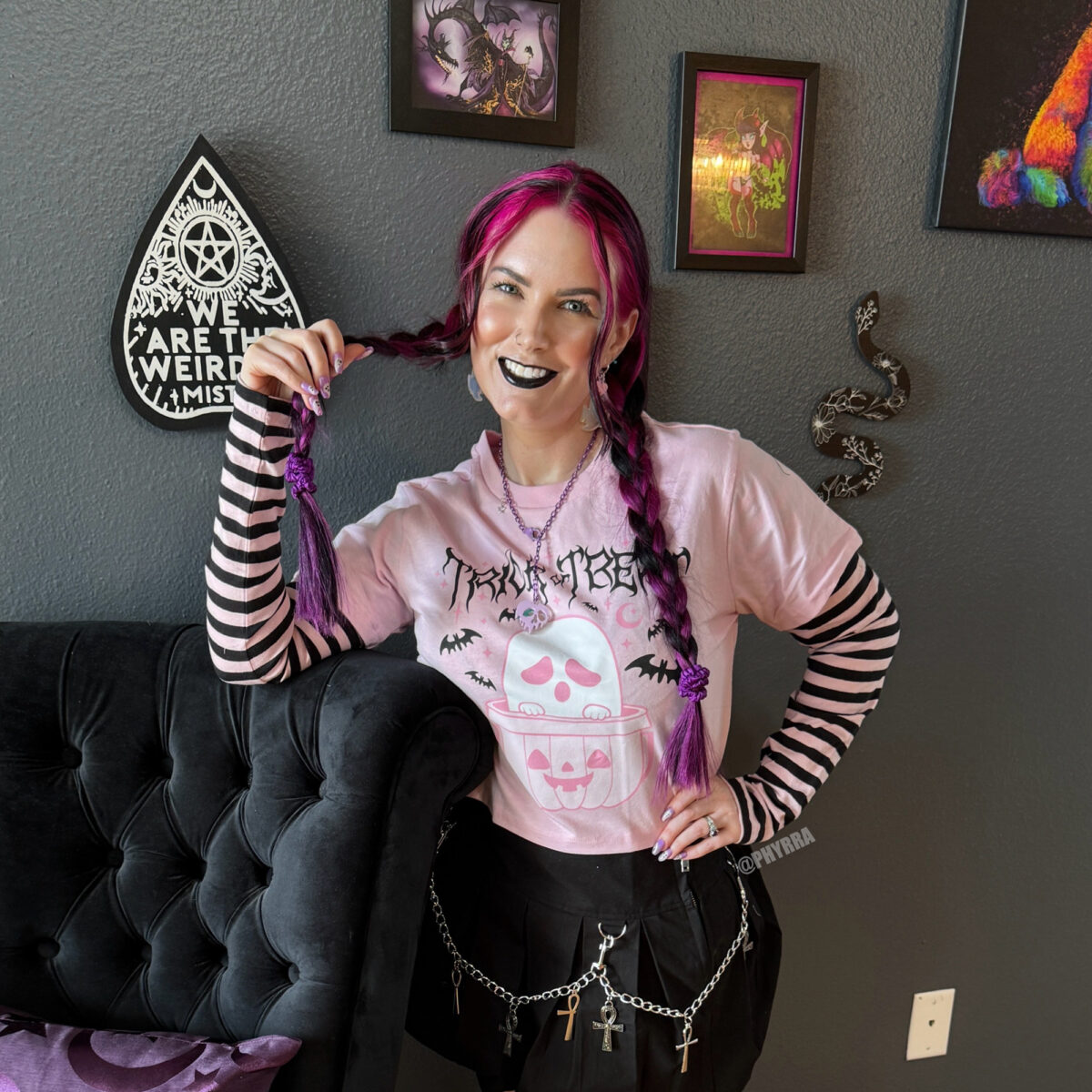 Cordelia is a Hot Topic Fanatic wearing pink and black.