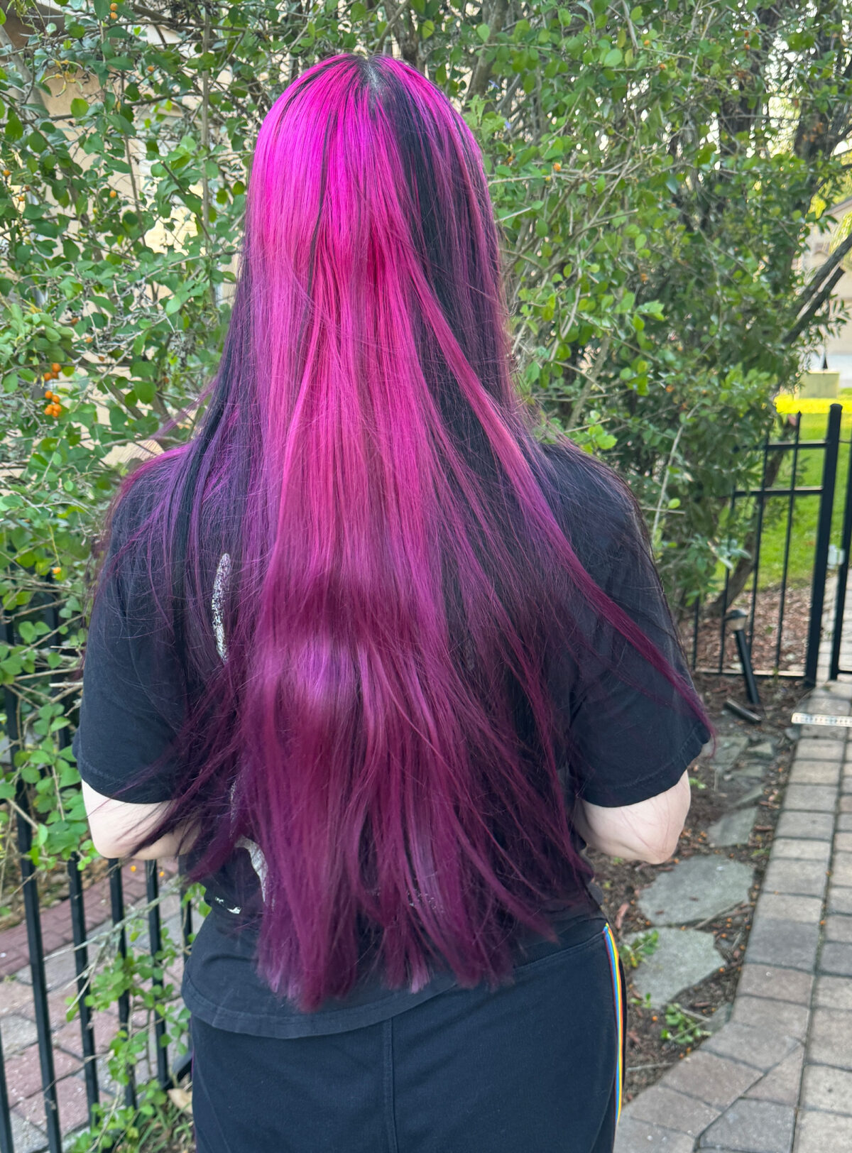 Cordelia's natural color treated hair is stick straight