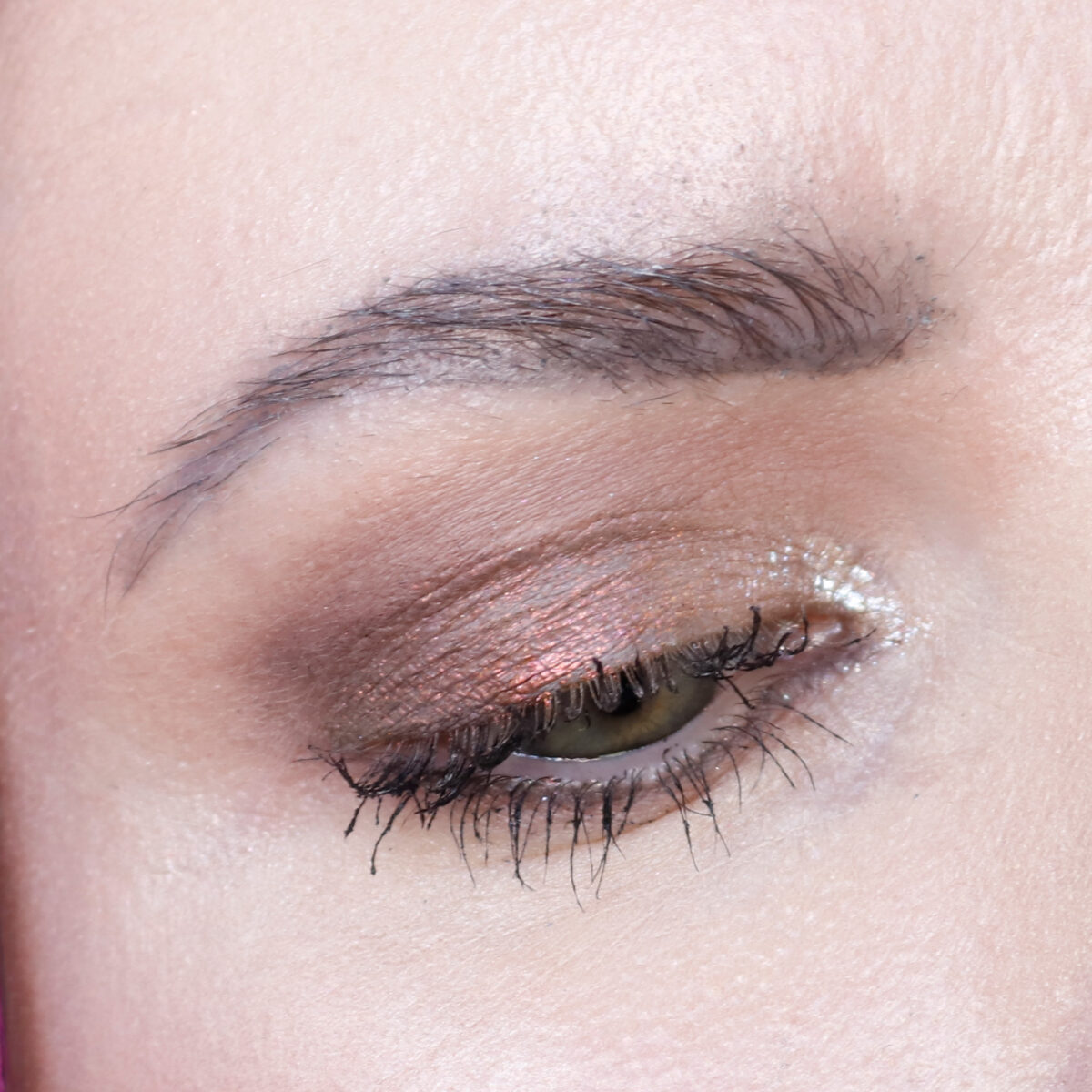 Natural makeup with About Face Holographic Eye Paint Total Eclipse diffused on top