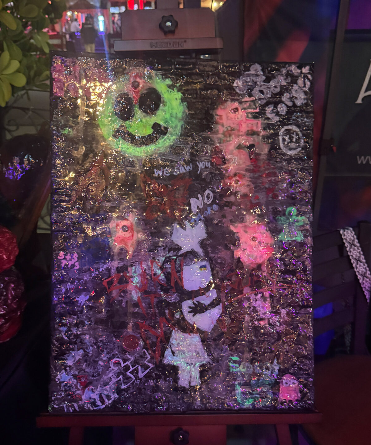 The Alchemist Artist Patty and one of her award winning pieces of artwork